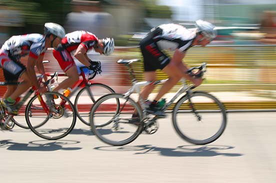 breaking away from the pack. Shot near the last lap of an intense bicycle race